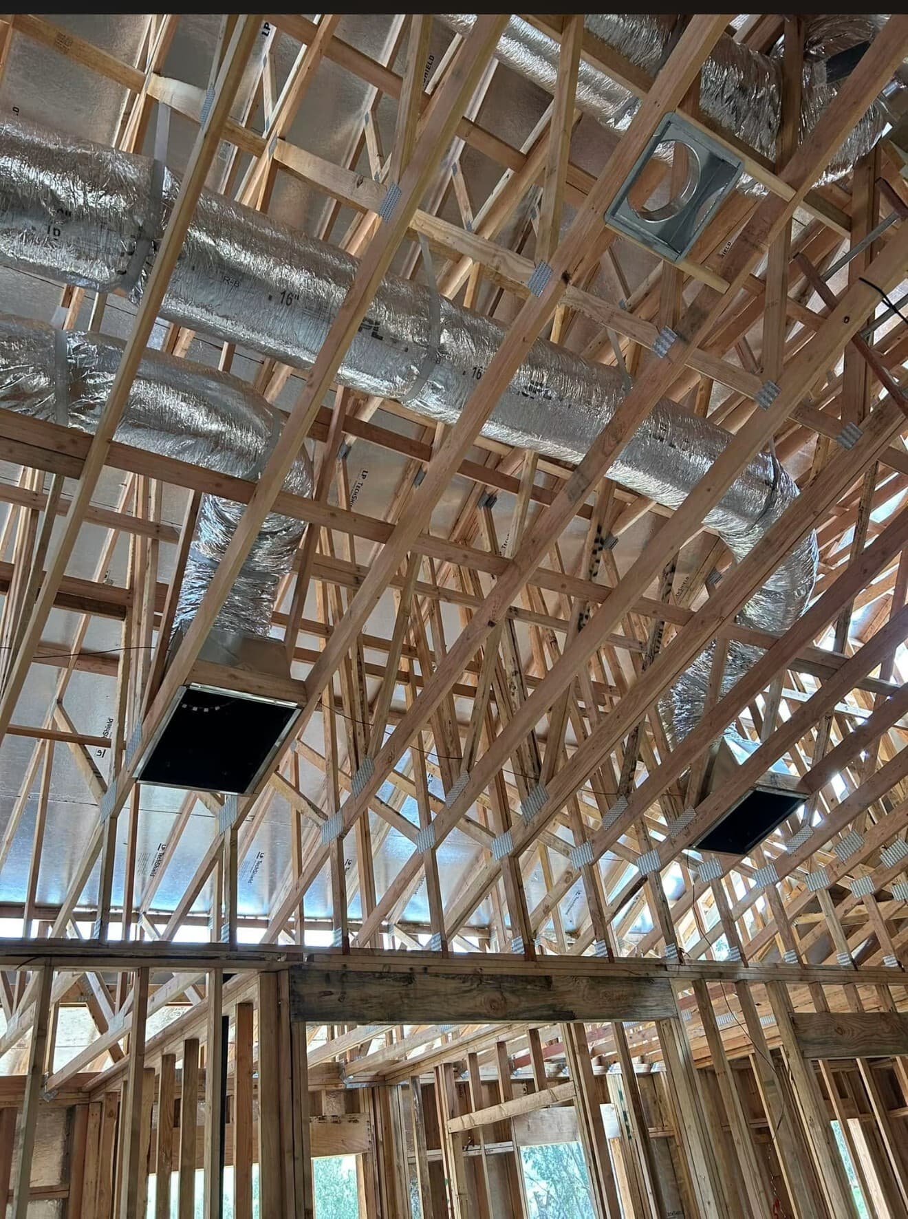 New insulated flex ductwork installed in an attic